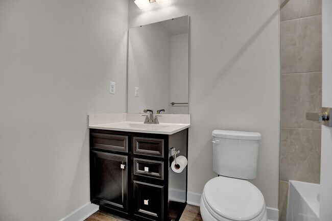 Building Photo - Luxury 4-Story Townhome with Rooftop Terrace!