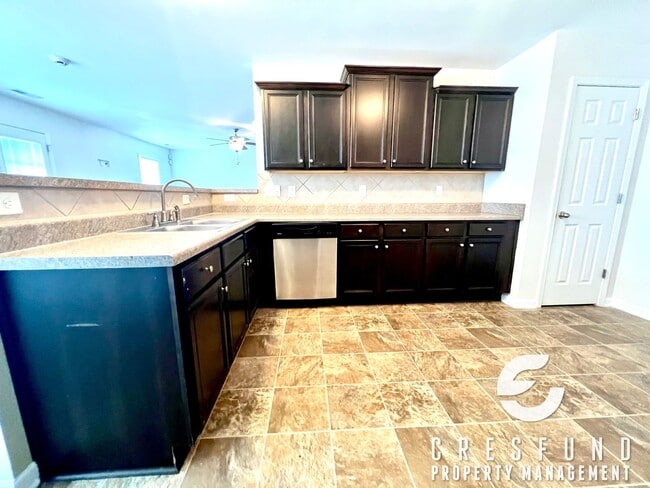 Building Photo - Freshly Painted and Spacious 4 Bedroom, 3 ...