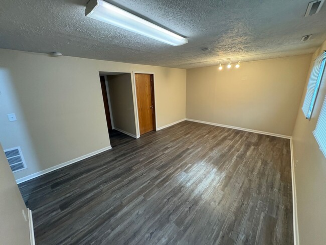 Building Photo - Spacious Single-Family Home with Fenced Backyard & Attached Garage