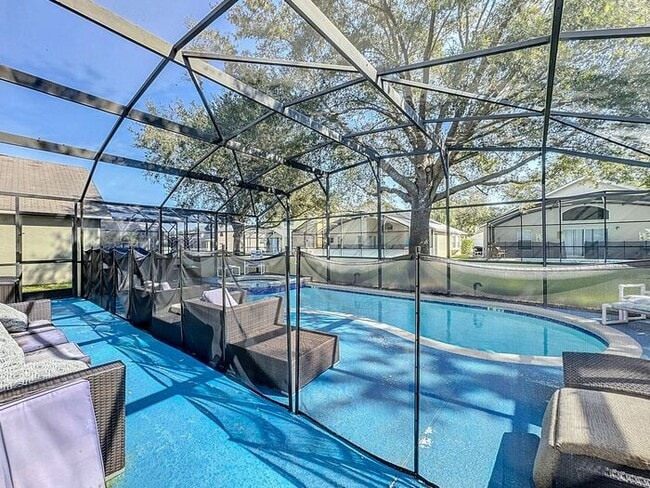 Building Photo - STUNNING Emerald Island Resort 5 bedroom 4.5 bath Luxury Home FULLY FURNISHED! 3 miles from Disney!