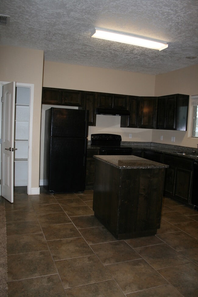 Building Photo - IMPRESSIVE HOME IN NEW SUBDIVISION NEAR HO...