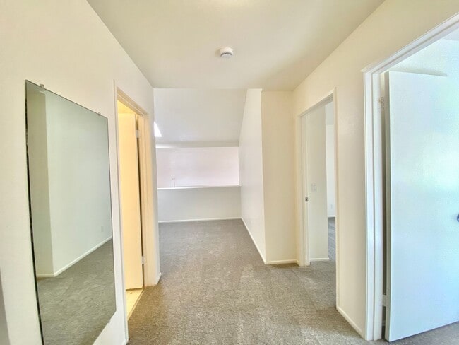 Building Photo - NEW PRICE! Spacious 3bdrm 2.5bath Condo w/2 car garage & private laundry hookups, community Pool ...
