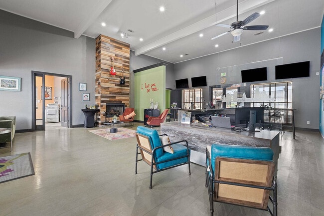 Stylish Community Lounge with Fireplace at Ovation Apartments in Austin, TX - Ovation Apartments