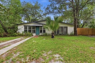 Building Photo - 3 BR/ 2 BA Mid Century Modern Home/Fenced Yard/Lawn Care Included
