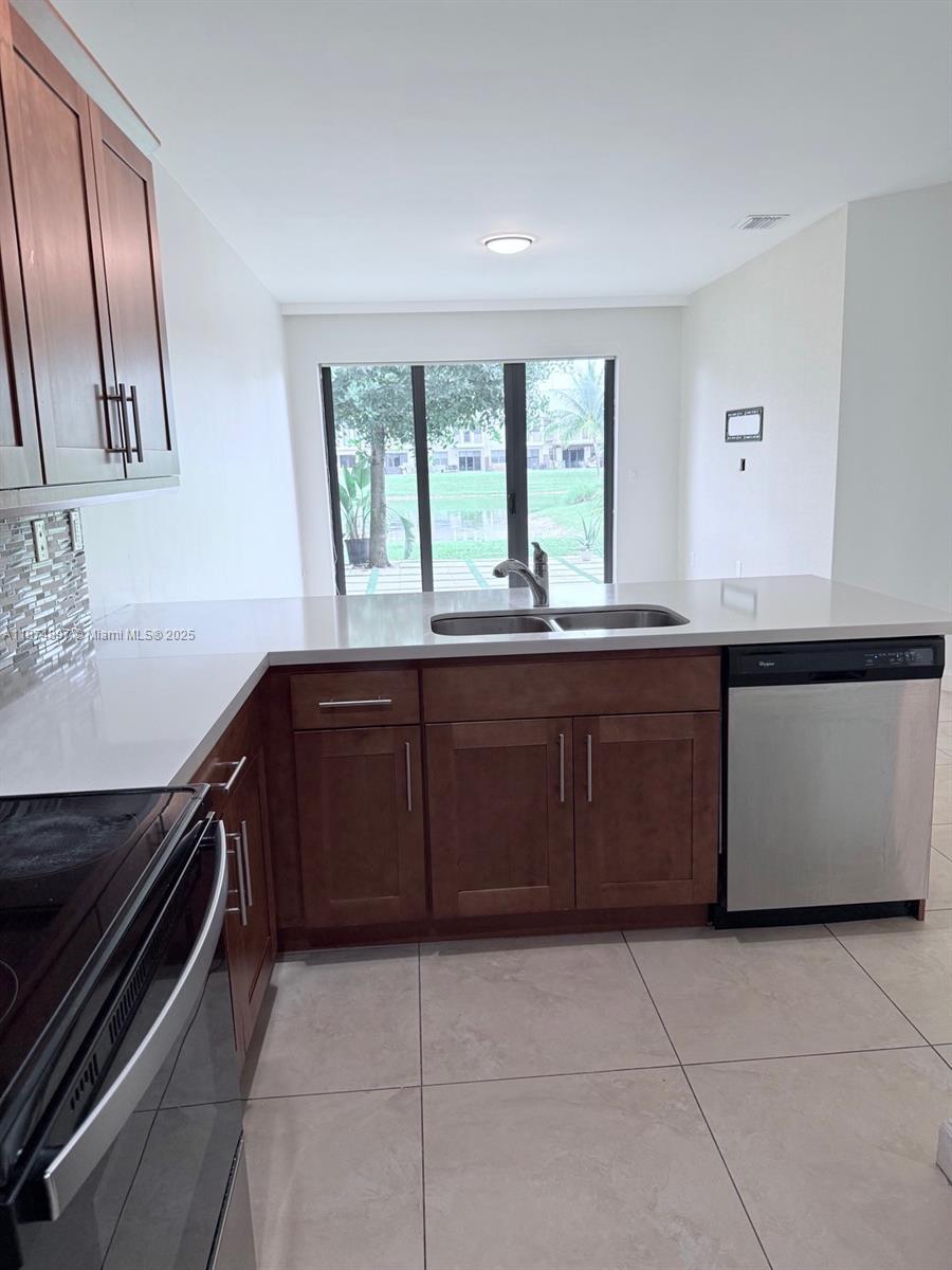 Building Photo - 5980 NW 104th Ct