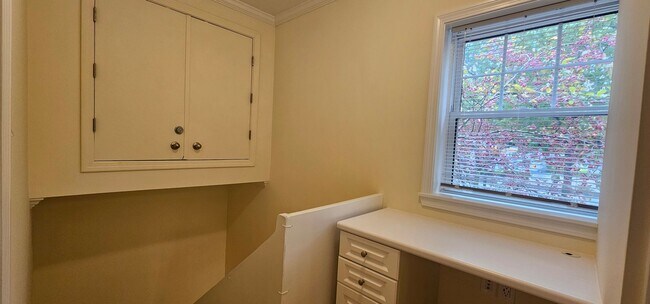 Building Photo - Spacious 2-bedroom townhouse on beautifully landscaped grounds.