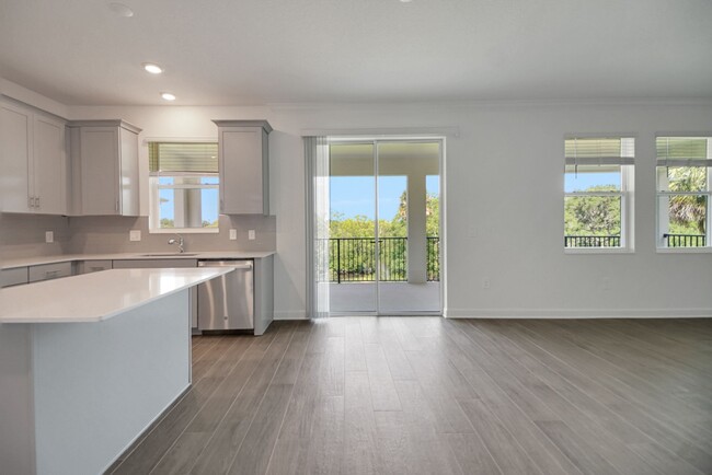 Building Photo - Stunning 4/3 in Gated Dora Parc! Water Views!