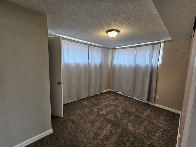 Building Photo - Welcome home to this maintained 4-bedroom, 2-bath Home in 80909!