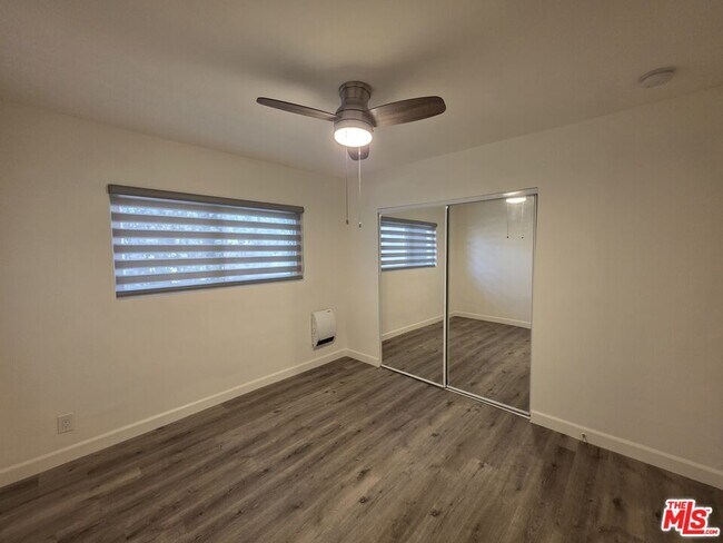 Building Photo - 10734 Palms Blvd