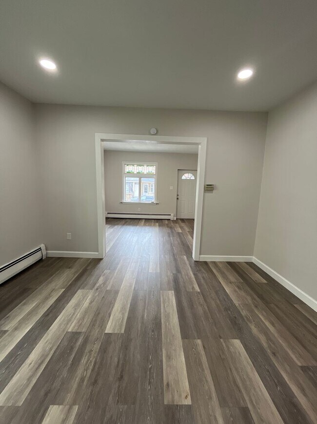 Building Photo - Freshly updated 3-bedroom, 1-bath twin hom...