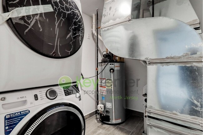 Building Photo - Modern New Construction 3 Bedroom Townhome with Garage & Driveway — First Occupancy!