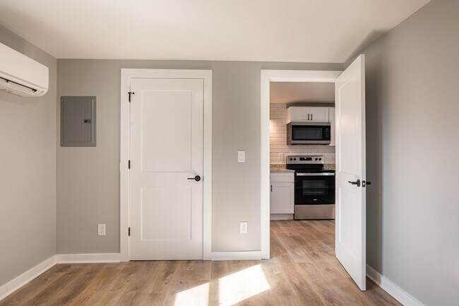 Building Photo - Discover Modern Living at Genesis Apartmen...