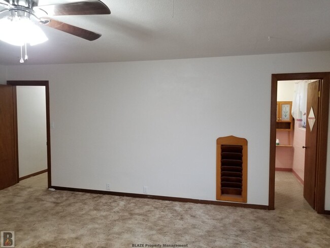 Building Photo - Massive Corner-Lot Home with Retro Charm & Shady Backyard!