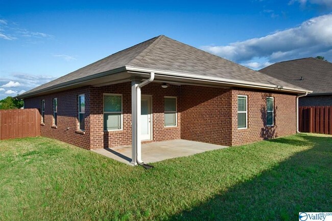 Building Photo - SPACIOUS FOUR BEDROOM BRICK HOME