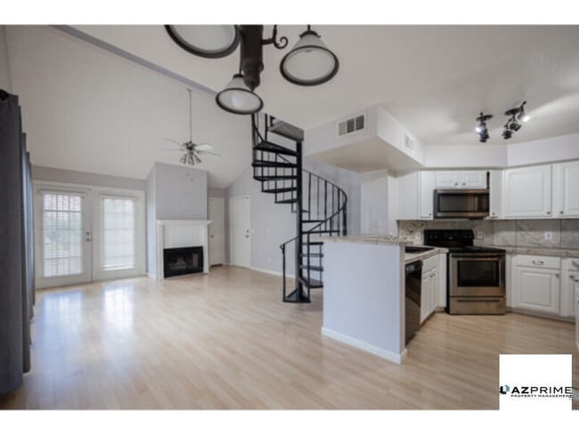 Building Photo - Live elevated in this premium upper-level ...