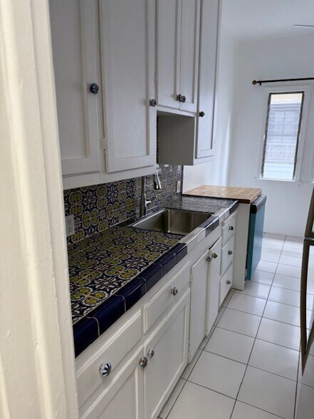 Origianl tile in kitchen - 232 N Clark Dr