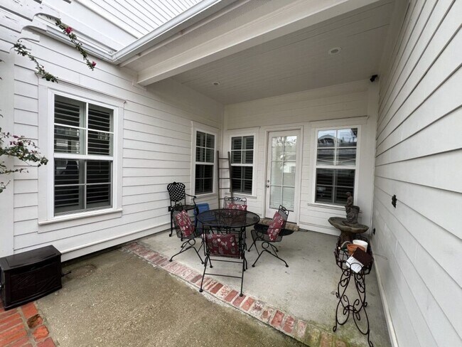 Building Photo - Luxury 4BR Home in Americana | 11 Ft Ceilings, Courtyard Living & Furnished Option at $3,950