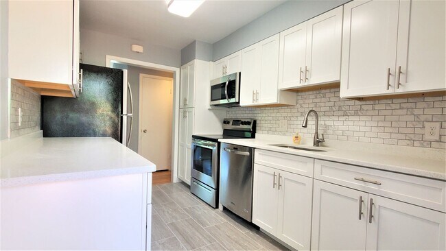 Building Photo - Awesome 4BR, 3BA Close In Bethesda Home With 2 Car Garage!!!