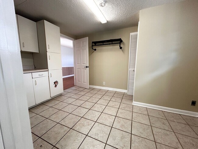 Building Photo - NOW AVAILABLE! 3 Bedrooms/1 1/2 Bath with Double living room space.