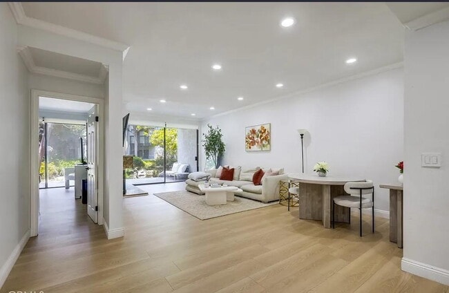 Building Photo - "Chic 1-Bedroom Retreat with Movie Room & ...