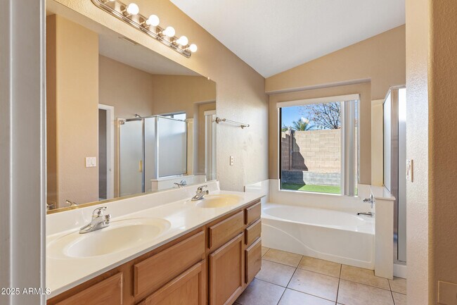 Building Photo - 9346 E Plana Ave