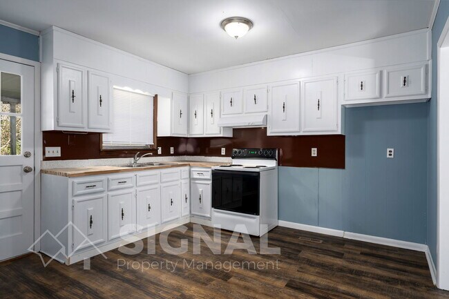 Building Photo - 1228 Huffman Rd