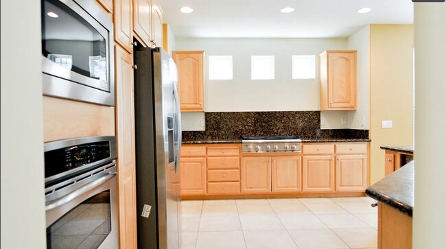 Building Photo - For Rent – Spacious 4-Bedroom Home with Bo...