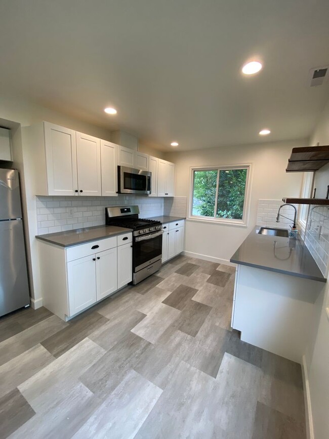 Building Photo - Remodeled Seattle Home on a corner lot, Av...