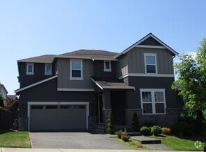 Building Photo - Spacious 4-Bedroom Home with Modern Comforts