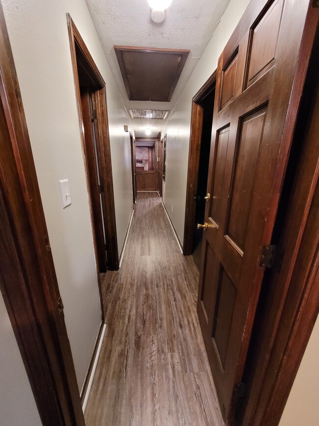 Hallway looking to Living room from master bedroom - 109 Wheeler Ct