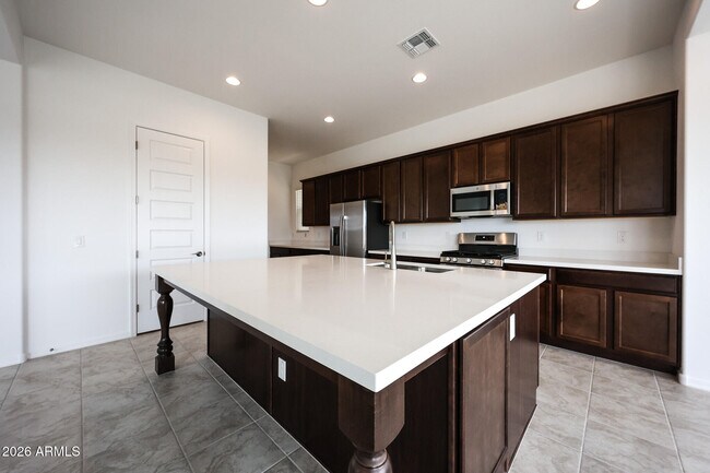 Building Photo - 7695 W Smoketree Dr