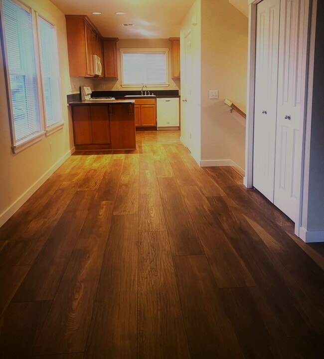 Building Photo - LIKE NEW three bedroom with fantastic updates, one car garage and private newly fenced front patio!