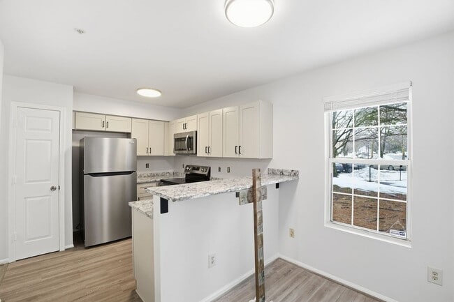 Building Photo - An inviting opportunity to make your next move truly feel like home.