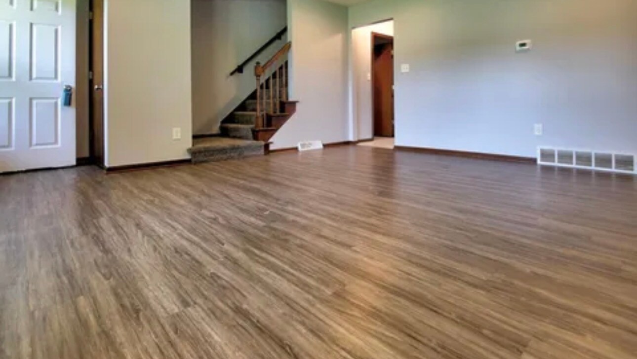 living room, stairs to upstairs bedrooms - 8653 Refugee Rd