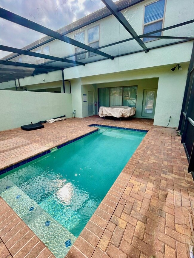 Building Photo - Spacious 5-Bed / 4.5-Bath Townhome w/ Private Pool & Sundeck in Gated Oakmont at Solterra Near Di...