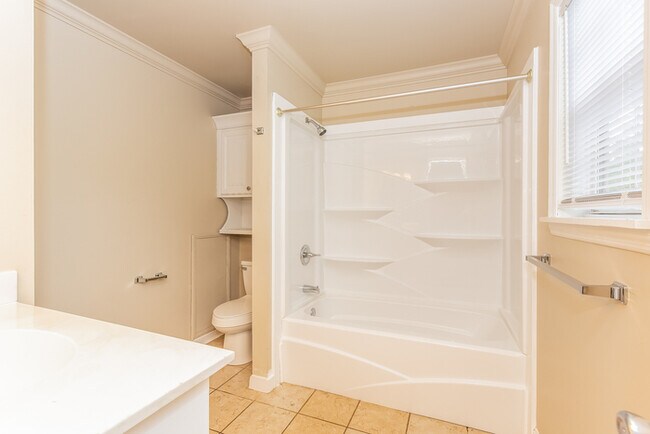Building Photo - Spacious 3-Bedroom Toney Home with Two-Car Garage