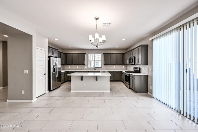 Building Photo - 3817 N 100th Dr