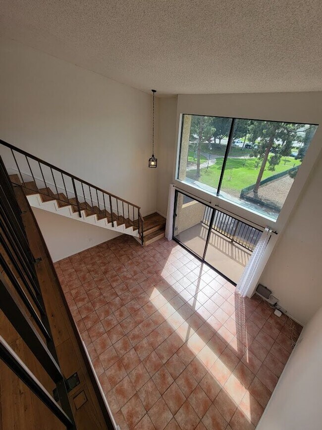 Building Photo - HUGE UPPER 1BD/1.5BA CONDO WITH LOFT, PARKING LAUNDRY AND 2 PRIVATE BALCONIES!!