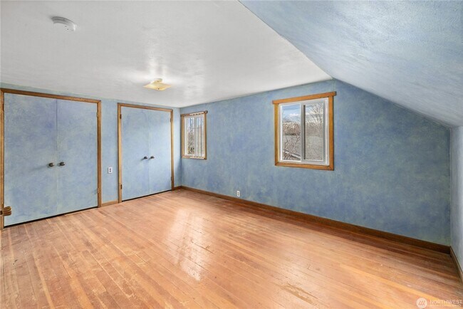 Building Photo - One-of-a-Kind Spacious Home with Beautiful Landscaped Grounds