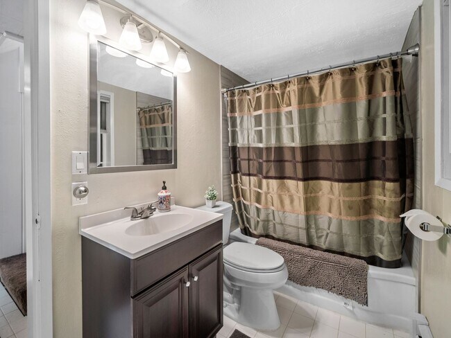 Building Photo - Spacious 2-Bedroom Home with Private Deck,...
