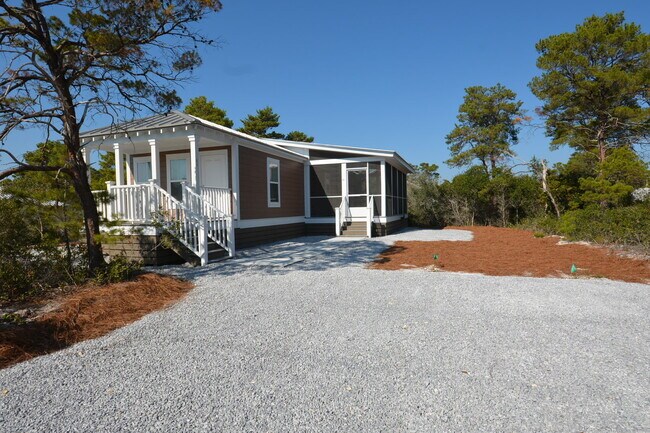 Building Photo - AVAILABLE 6/10/26 Adorable 2 bedroom cottage available long term off 30A! Huge screened in porch ...