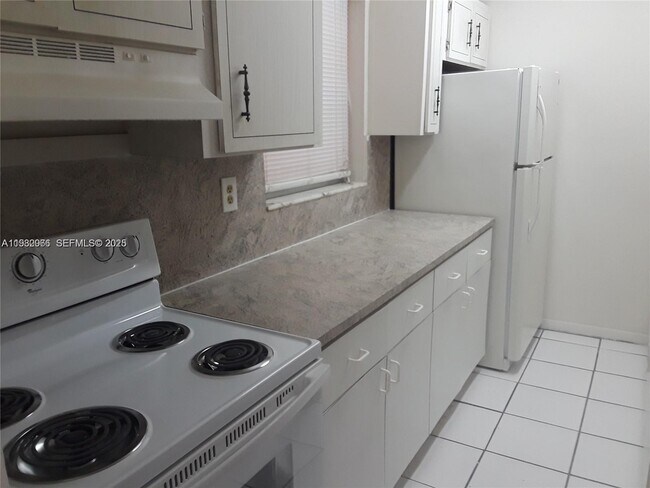 Building Photo - 3675 W 11th Ave