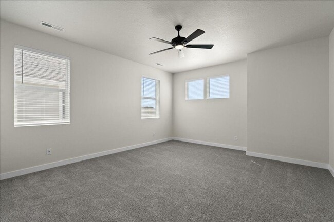 Building Photo - Spacious 4-Bedroom Home with Modern Comforts