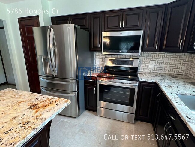 Building Photo - 5786 Honors Ct