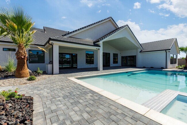 Building Photo - Gorgeous Custom Single Story with RV Garage