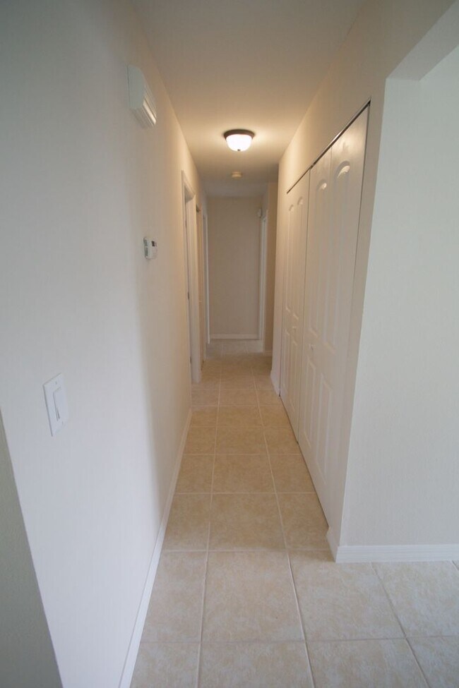 Building Photo - Waterfront 3BR Home on Canal | Spacious Yard | Lawn Care Included | Pet Friendly