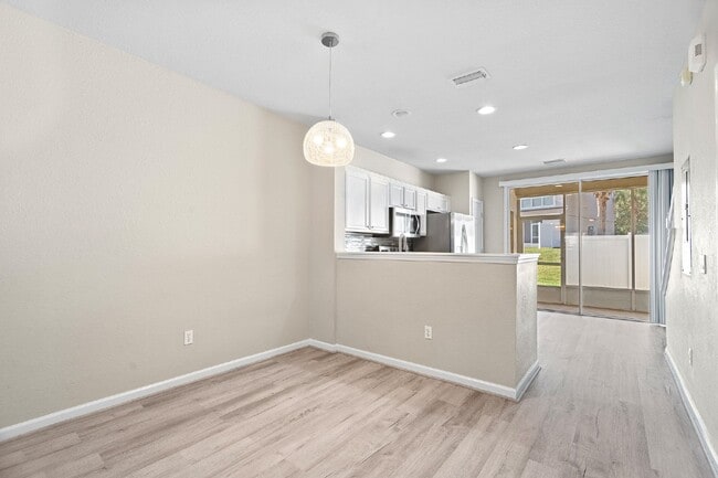 Building Photo - **NEWLY REMODELED ** MAINTENANCE FREE TOWN...