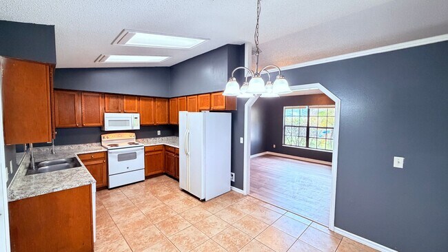 Building Photo - $500 OFF A MONTHS OF RENT IF YOU APPLY BEFORE MAY 12TH. Pet-Friendly 3BR Home with Spacious Yard ...