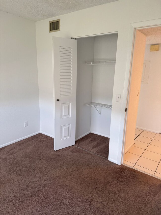 Building Photo - Centrally located condo in great community
