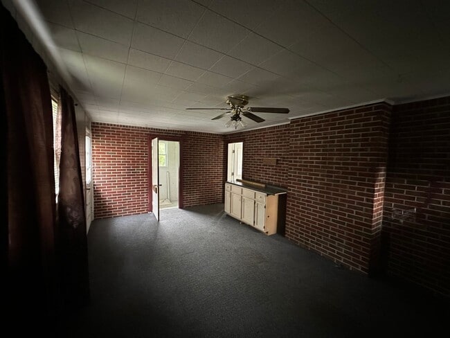 Building Photo - ONE LEVEL BRICK RANCHER WITH EXTRA LARGE LOT
